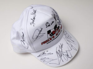 Freck’s Auto Art Cap Signed by Penske, Moss, Montoya, Fittipaldi + 7 more - View 4